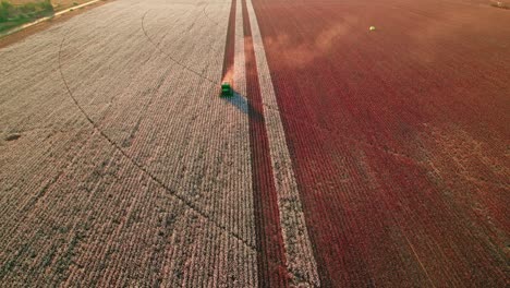 Drone-view-of-a-tractor-harvesting-cotton