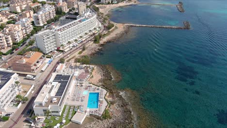 Mallorca:-Aerial-View-Of-Resort-Town-Son-Servera-On-Majorca-Island,-Spain,-Europe-|-Waves-on-Shore