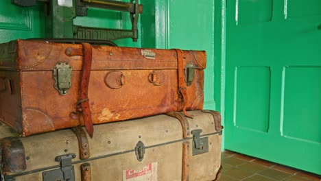 Retro-luggage-suitcases-on-weigh-scale-British-Railways-station-office