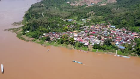 Aerial-View-Of-Whiskey-Village-Beside-Mekong-River-In-Luang-Prabang