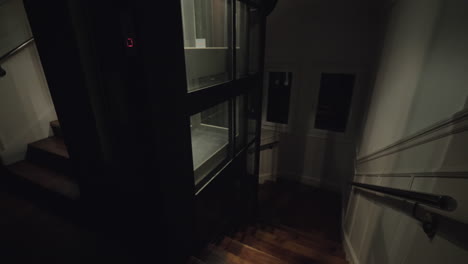 Woman-getting-upstairs-using-elevator