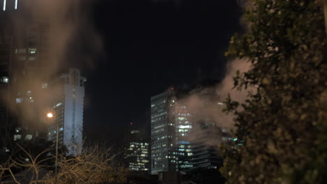 Tel-Aviv-night-cityscape-with-condensing-steam