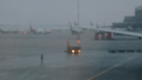 Plane-parking-at-the-airport-defocused-view