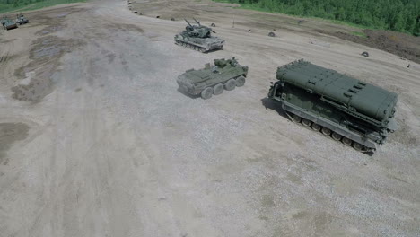 Flying-over-military-vehicles-on-shooting-ground
