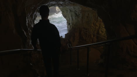 Tourist-admiring-the-beauty-of-sea-caves-in-Rosh-Hanikra