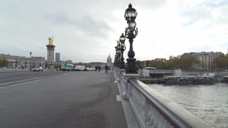 Pont-Alexandre-III-Bridge-At-its-four-extremities-are-huge-17-metre-high-pylons-crowned-with-gilt-bronze-sculptures-of-winged-horses-representing-the-illustrious-Arts,-Sciences,-Commerce-and-Industry