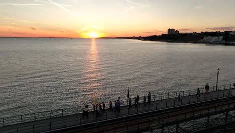 Southend-Pier-Sunset-fly-over-with-drone-shows-Scouts-walking-along-Southend-Pier
