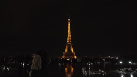 People-Taking-Their-Photos-In-Front-of-Eiffel-Tower-at-Night-in-Place-du-Trocadero