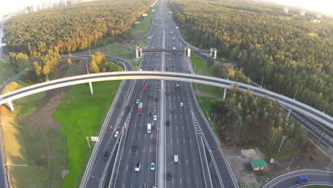 Flying-over-motorway-in-city-outskirts