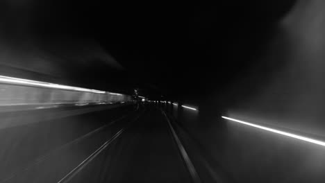 Monochrome-timelapse-of-subway-train-on-the-route