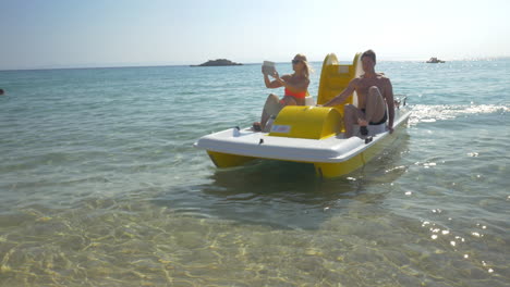 Family-enjoying-sea-ride-on-pedal-boat