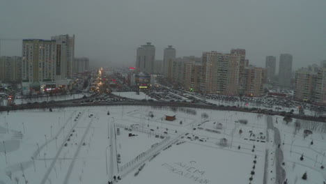 Winter-city-and-Happy-Birthday-on-snow-aerial-view