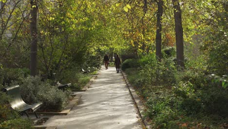 Parisian-Woman-Walks-Her-Dog-In-Coulee-Verte-Rene-Dumont-Park