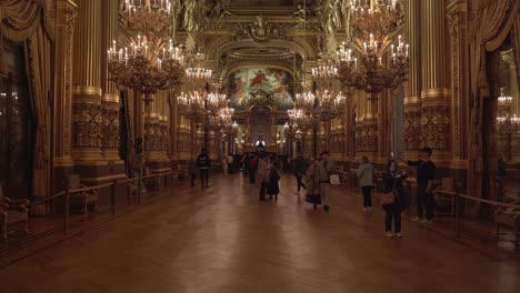 People-Walking-Inside-of-Grand-Foyer-of-Palais-Garnier