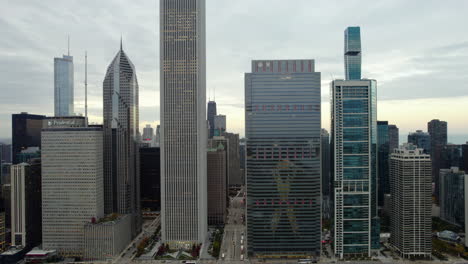 Aerial-view-tilting-toward-the-Columbus-drive-in-middle-of-High-rise-of-Chicago