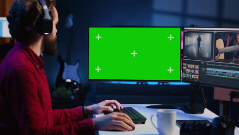 Expert-using-post-production-techniques-to-edit-raw-clips-footage-on-isolated-screen-monitor