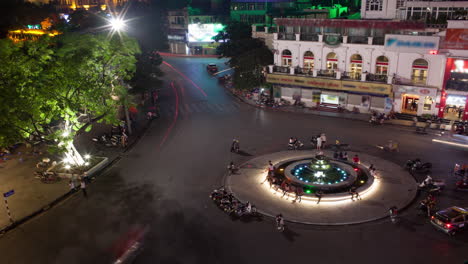Time-lapse-shot-of-circular-intersection-at-night-aerial-view-of-Quang-truong-Dong-Kinh-Nghia-Thuc-Hanoi-Vietnam