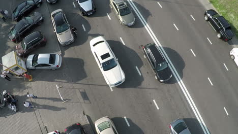 Aerial-view-of-cameraman-shooting-driving-cars