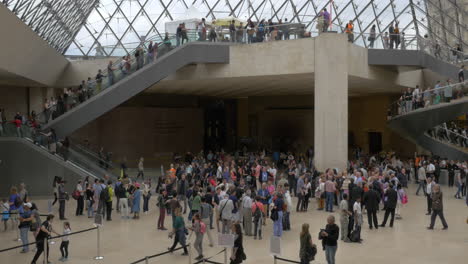 Busy-underground-lobby-of-Louvre-Pyramid