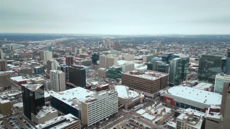 Beautiful-Establishing-4K-Drone-Shot-Daytime-Winter-Arctic-Calm-Weather-Snow-Covered-Buildings-in-Downtown-Northern-Community-Winnipeg-Manitoba-Canada