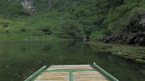 In-Trang-an-bai-in-Hanoi-Vietnam-riding-from-first-person-on-boat-on-river-with-scenic-views