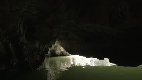 In-Halong-Bay-in-Hanoi-Vietnam-from-first-person-in-boat-seen-river-and-grotto