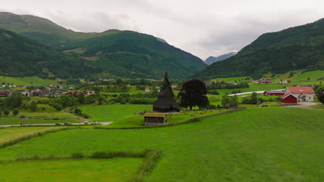 Hopperstad-Stave-Church-in-green-countryside,-Vik,-Norway