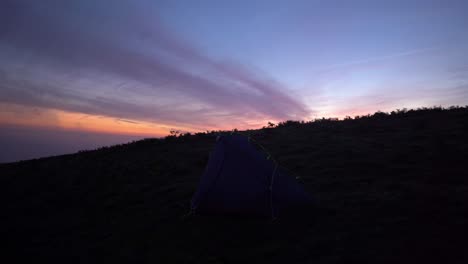 Time-lapse-of-remote-wild-camping-tent-at-sunrise-in-Northern-Spain
