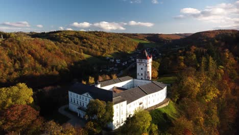 State-Chateau,-Hradec-nad-Moravicí-And-White-Tower-During-Autumn-Season-In-Hradec-nad-Moravicí,-Czechia