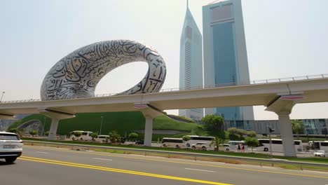 Museum-of-the-Future-Seen-From-A-Car-Driving-At-Sheikh-Zayed-Road-In-Dubai,-UAE
