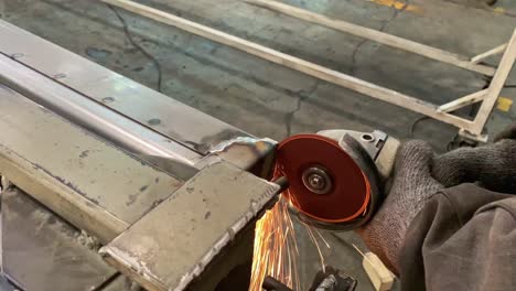 Man-at-work-grinding-steel