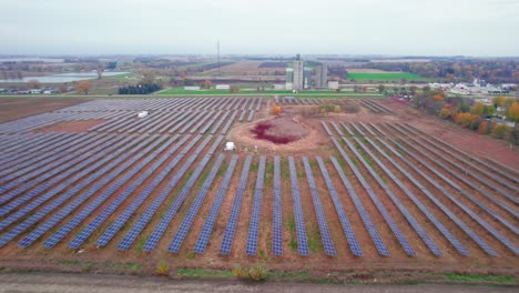 Flying-Over-Wide-Setup-Of-Solar-Panels-In-Lines-,-Atwater,-MN,-USA