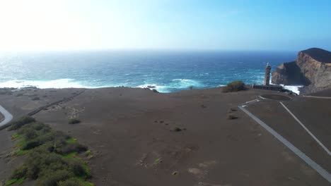 Man-contemplating-volcanic-landscape-of-Capelinhos,-Azores