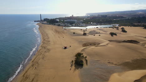 Flying-in-reverse-along-the-shore-of-Maspalomas-beach-and-spotting-the-Maspalomas-lighthouse