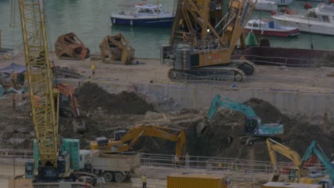 In-Hong-Kong-China-are-going-construction-work---excavators-digging-ground