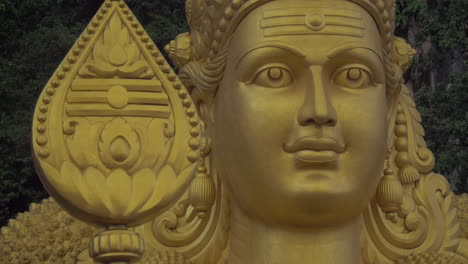 Close-up-of-head-of-statue-of-Murugan-at-Batu-Caves-Malaysia