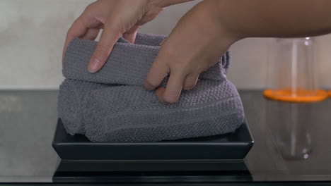At-table-in-hotel-are-rolled-up-towels