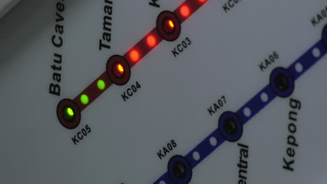 Close-up-view-of-lighting-green-and-red-bulbs-on-train-map-Kuala-Lumpur-Malaysia