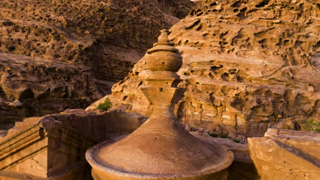 Urn-Topped-On-Conical-Roof-Of-Ad-Deir-Monastery-During-Sunset-In-Petra,-Jordan