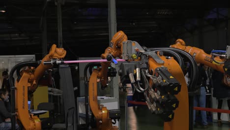View-of-industrial-robots-that-moving-with-light-sticks