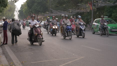 Motorbikes-and-cars-traffic-on-Hanoi-highway-Vietnam