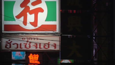 In-evening-in-street-seen-bright-and-shining-signs-and-signboard-of-a-local-restaurant