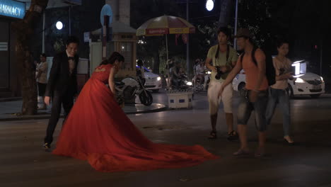 Newly-weds-making-photo-on-the-road-Hanoi-Vietnam