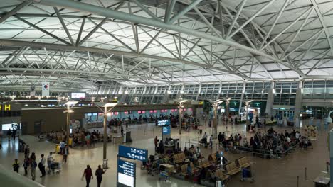 Timelapse-of-airport-seen-people-waiting-for-the-flight