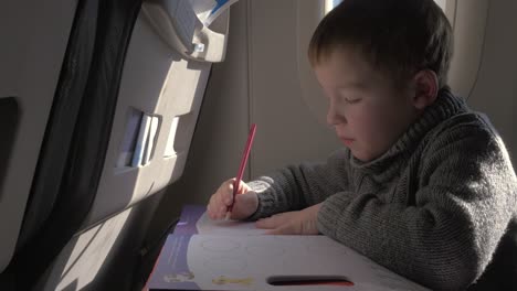 Child-drawing-during-the-flight