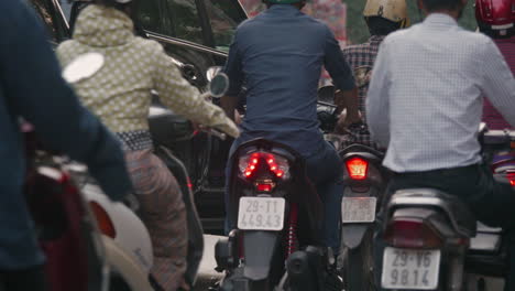A-lot-of-motorcycles-driving-in-traffic-jam