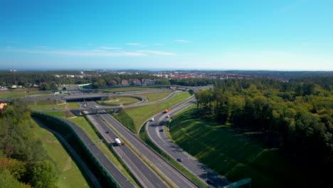 Aerial-landscape-of-highway-interchanges-with-lush-greenery-around-the-roads