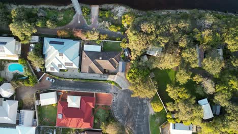 Travelling-Top-Shot-over-Busselton-City-Neighborhood-Houses-Roofs,-Australia