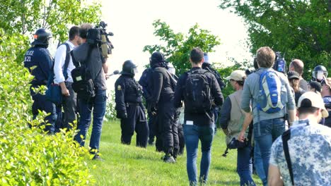 Protester-arguing-with-police-during-G7-Summit-meeting