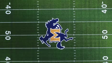 Aerial-shot-of-college-football-field-Mcneese-University-green-grass-field-yard-line